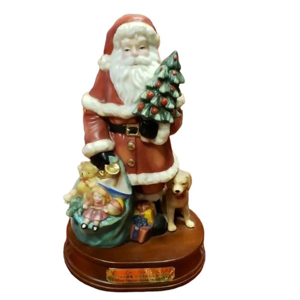 Tree trimming Christmas Santa statue